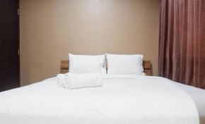 Minimalist 2BR Apartment at Tamansari Papilio By Travelio